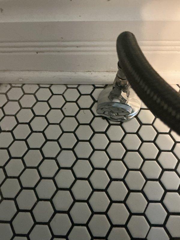 Replaced existing 17-year-old toilet with new ADA-compliant round bowl toilet. Installed new shut-off valve and water supply line to ensure proper function and code compliance. Unit tested successfully with no leaks detected.