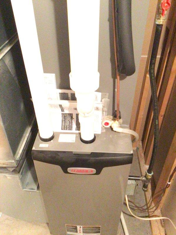 Performed comprehensive furnace tune-up on 3-year-old Lennox unit including flame sensor cleaning, complete electrical system testing, and air filter replacement. All electrical components tested within manufacturer specifications and unit confirmed operating properly. Customer declined exterior AC unit inspection that was initially requested regarding potential code compliance concerns about clearance distance from structure.
