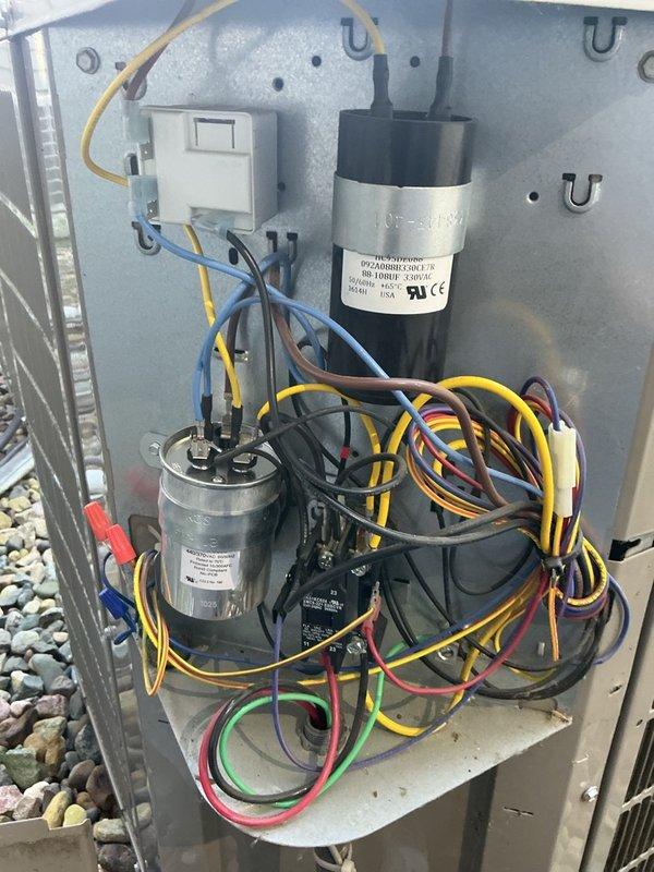 Responded to no cool complaint on 5-year-old system with fault code 24 (secondary voltage fuse open) on furnace control board following previous capacitor replacement attempt by handyman. Diagnosed blown fuse on control board, replaced fuse, and verified contactor, capacitor, and wiring at condensing unit were functioning properly. System restored to cooling operation after fuse replacement and component verification.