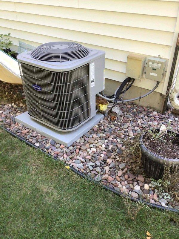 Completed comprehensive AC tune-up on Carrier outdoor condensing unit. Performed thorough washing of outdoor unit coils and cabinet, tested all electrical components and connections at disconnect box, and verified proper system operation. Unit found to be functioning correctly with no issues identified during inspection.