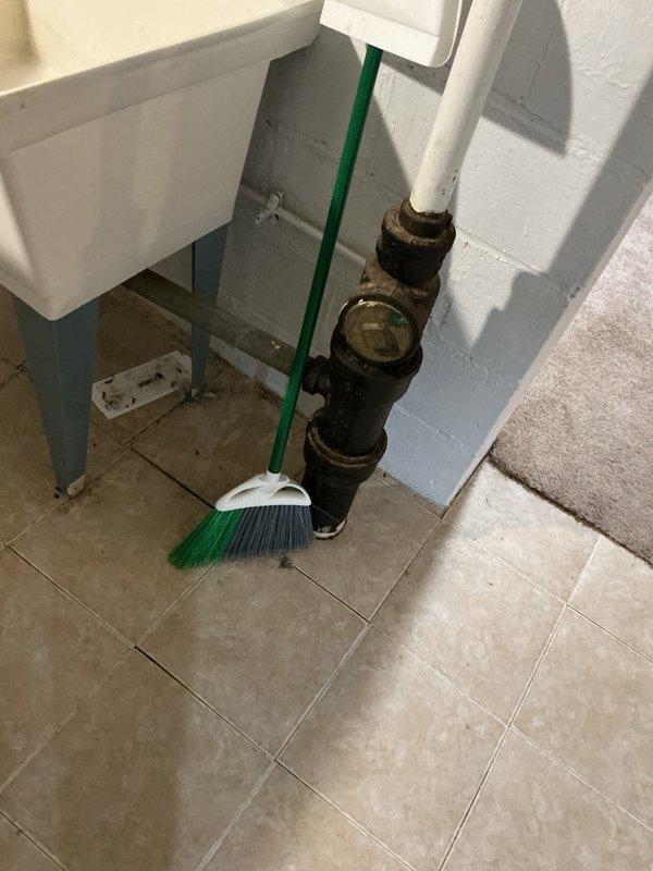 Responded to emergency call for water throughout basement with unknown source. Upon inspection, determined the issue was a backed-up sewer main rather than a supply line leak. Dispatched specialized drain cleaning equipment to clear the main sewer blockage and restore proper drainage to the property.