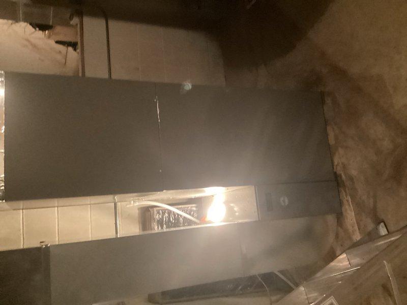 Responded to HVAC install callback for damaged ductwork insulation in basement mechanical room. Upon inspection, found existing duct felt liner torn and compromised at multiple corners with several holes present. Removed deteriorated felt material from rectangular metal supply duct and replaced with new insulation liner, ensuring proper sealing at all seams and corners to restore system efficiency and prevent air leakage.