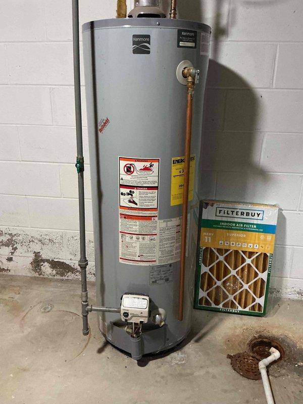 Completed comprehensive furnace tune-up on Lennox heating system including cleaning flame sensor, inspecting air filter, and verifying proper amperage draw on inducer motor and ECM motor. Measured carbon monoxide levels with satisfactory PPM readings and confirmed temperature rise at 42 degrees. System operating and heating properly. Heat exchanger inspection could not be completed due to camera equipment connectivity issues.