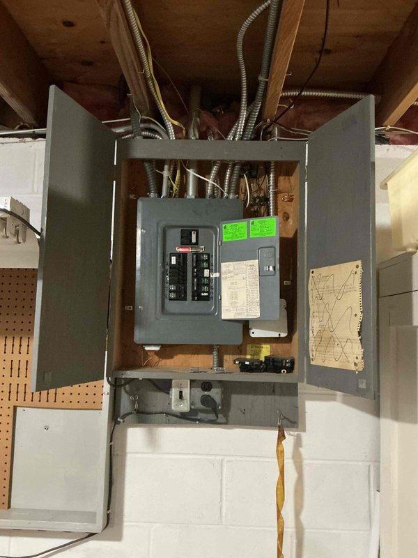 Completed comprehensive furnace tune-up on Lennox heating system including cleaning flame sensor, inspecting air filter, and verifying proper amperage draw on inducer motor and ECM motor. Measured carbon monoxide levels with satisfactory PPM readings and confirmed temperature rise at 42 degrees. System operating and heating properly. Heat exchanger inspection could not be completed due to camera equipment connectivity issues.