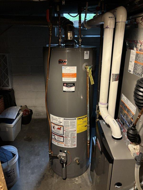 Performed comprehensive annual plumbing inspection including water and drain lines in basement, flushed recently installed water heater, and inspected laundry tub, toilet, and exterior faucet shut-off valves. Conducted fixture inspections on main level and performed hard water testing. All plumbing systems, water heater, and fixtures tested within normal operating parameters with no immediate concerns identified. Discovered structural cracks on underside of laundry tub showing early signs of water seepage and provided replacement estimate for laundry tub and faucet assembly.