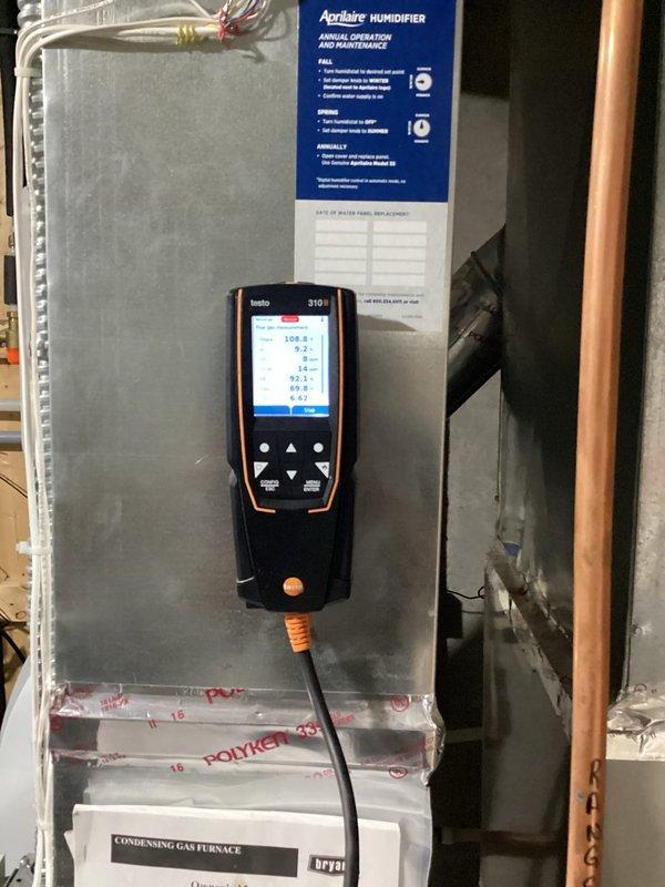 Completed annual heating maintenance on a ten-year-old Bryant high-efficiency condensing gas furnace. Performed comprehensive system inspection and tune-up to ensure safe and efficient operation. Measured temperature splits and found them on the high end, prompting further investigation. Checked gas inlet and manifold pressures using combustion analyzer and found them slightly elevated. Adjusted gas pressures down to 3.5 inches water column to meet manufacturer specifications. 

Conducted thorough heat exchanger inspection and observed heat marks and discoloration consistent with normal wear for system age. No cracks, holes, or compromised areas detected. Recommended continued annual monitoring of heat exchanger condition. Verified air filter was clean and in good condition. Inspected igniter and flame sensor; both components found to be functioning properly with no buildup or deterioration.

Measured inducer motor amperage draw and found it on the high end of acceptable range but stil