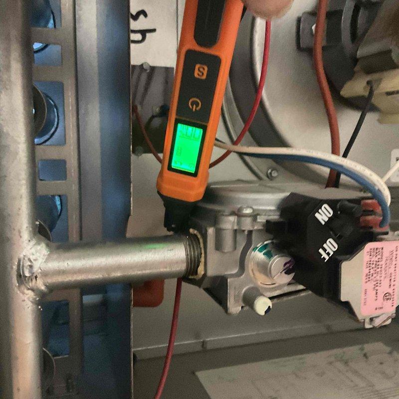Performed comprehensive tune-up on 15-year-old furnace in lower level as requested for home sale inspection. Replaced dirty air filter and conducted diagnostic testing on gas valve assembly and control systems to verify proper operation. All systems confirmed working properly and in good operating condition. Additionally inspected and serviced two garage heaters, confirming all units are functioning safely and efficiently for new homeowner.