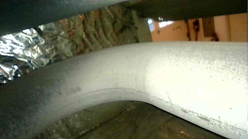 Performed comprehensive tune-up on 15-year-old furnace in lower level as requested for home sale inspection. Replaced dirty air filter and conducted diagnostic testing on gas valve assembly and control systems to verify proper operation. All systems confirmed working properly and in good operating condition. Additionally inspected and serviced two garage heaters, confirming all units are functioning safely and efficiently for new homeowner.
