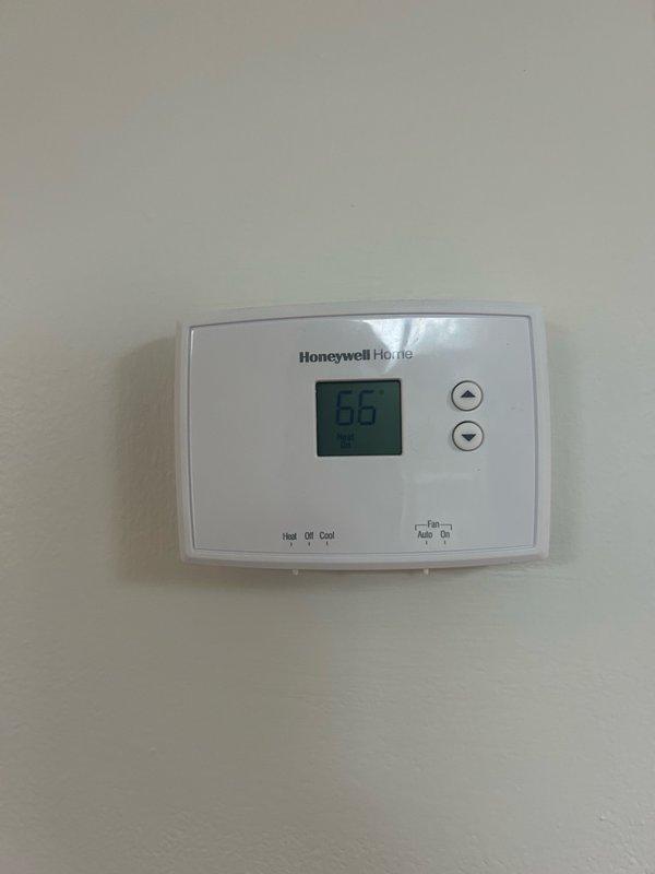 Completed scheduled heating maintenance on a 22-year-old Lennox furnace system. Performed comprehensive tune-up inspection including thermostat operation verification, air filter condition assessment, blower assembly inspection, burner and heat exchanger compartment examination, inducer operation check, ignition system testing, flame sensor inspection, safety controls verification, electrical component assessment, and temperature rise measurements. All system readings were within normal operating parameters with no mechanical deficiencies or safety concerns identified. System is operating properly at this time. Recommended maintaining regular filter replacement schedule.