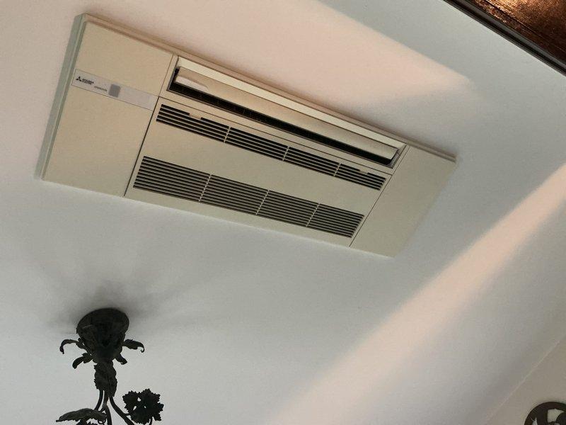Responded to no cooling complaint on ceiling-mounted mini-split system. Upon arrival, observed outdoor unit fan motor operating briefly for approximately 30 seconds before shutting down, with compressor failing to engage. Performed diagnostic testing including voltage verification from control board to compressor and resistance testing across all three compressor windings (U, V, W) at both the harness connection and directly at the compressor terminals. All windings measured open line (OL), confirming compressor failure. Submitted parts request for compressor replacement and provided estimate for repair.