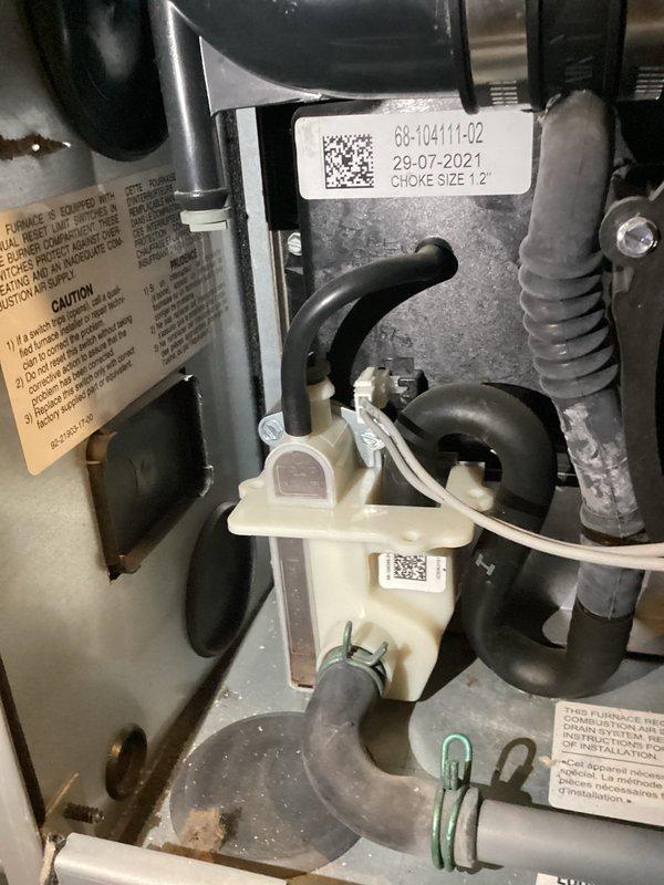 Responded to service call for Rudd furnace displaying error code 58 and unable to run while AC system remained operational. Diagnosed faulty sensor reading caused by debris obstruction in sensor plug connection. Removed foreign material blocking the pressure switch port, cleared the error code, and verified proper sensor operation and furnace functionality upon completion.