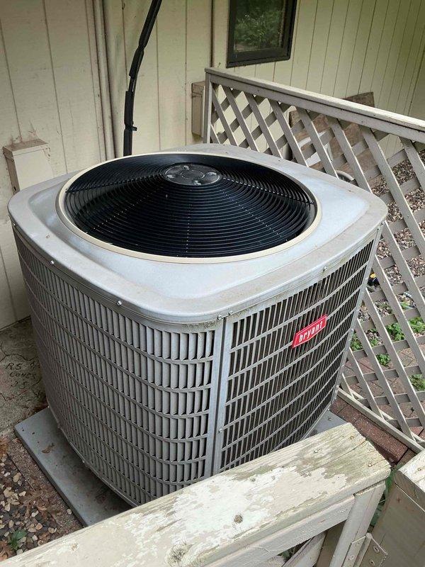 Responded to no cooling call on system over 10 years old displaying Code 72 thermal cut-off lockout. Upon inspection, found outdoor condenser coil completely blocked with debris and contamination. Thoroughly cleaned and rinsed condenser coil to restore proper airflow. After cleaning, attempted system startup and discovered compressor exhibiting excessive vibration and internal metal rattling noises indicating mechanical failure. Verified refrigerant charge was within acceptable range, confirming compressor internal component failure as root cause of thermal lockout and loss of cooling capacity. 

Performed courtesy inspection of indoor furnace unit and identified questionable areas on heat exchanger showing signs of potential deterioration. Advised homeowner of heat exchanger condition and recommended monitoring throughout remaining heating season with annual inspection. Documented findings with photographic evidence showing condenser unit exterior condition and contaminated coil surfa