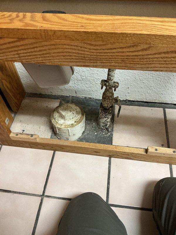 Responded to main line sewer backup caused by toilet paper obstruction located approximately 7 feet from access point. Successfully cleared blockage using mechanical cable equipment, restored proper drainage flow, and performed video camera inspection to verify complete clearance and assess line condition.