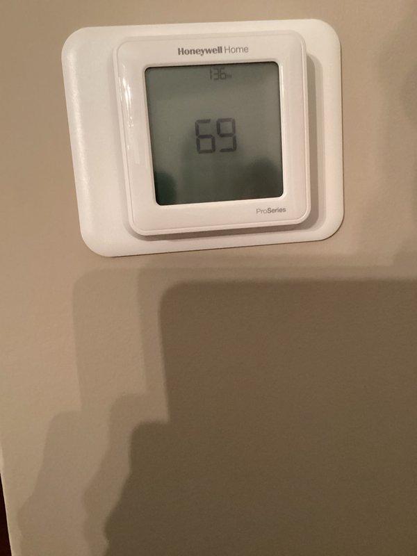Completed scheduled boiler tune-up and maintenance inspection. System operating properly with thermostat reading 69°F at time of service. Documented existing moisture damage and efflorescence on brick surfaces near mechanical equipment, indicating long-term water exposure that should be monitored. No immediate repairs required at this time.