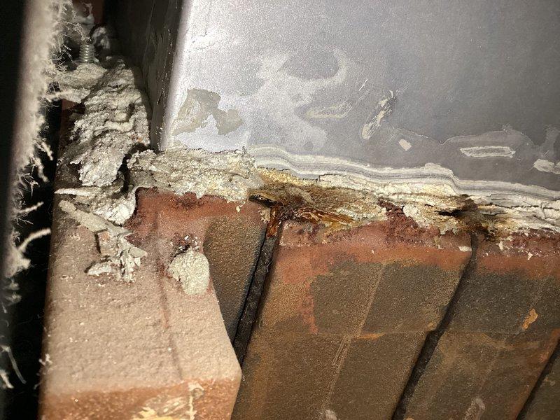 Completed scheduled boiler tune-up and maintenance inspection. System operating properly with thermostat reading 69°F at time of service. Documented existing moisture damage and efflorescence on brick surfaces near mechanical equipment, indicating long-term water exposure that should be monitored. No immediate repairs required at this time.