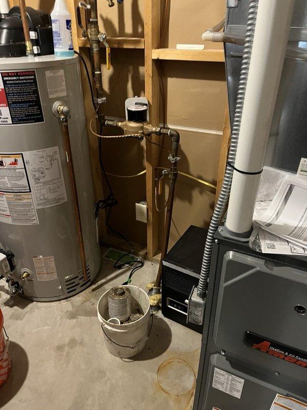 Responded to no hot water call and found 20-year-old water heater had been disassembled by homeowner in attempted repair. Removed failed unit and installed new 50-gallon natural gas power vent water heater with proper copper piping connections, pressure relief valve, and shut-off valves. Tested system for proper operation and verified hot water delivery throughout residence.