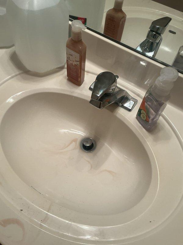 Completed comprehensive plumbing inspection of residential bathroom fixtures including sink, faucet, drain assembly, and shower system with glass enclosure. All fixtures were visually examined for proper operation, leaks, and potential maintenance concerns, with photographic documentation captured for service records.