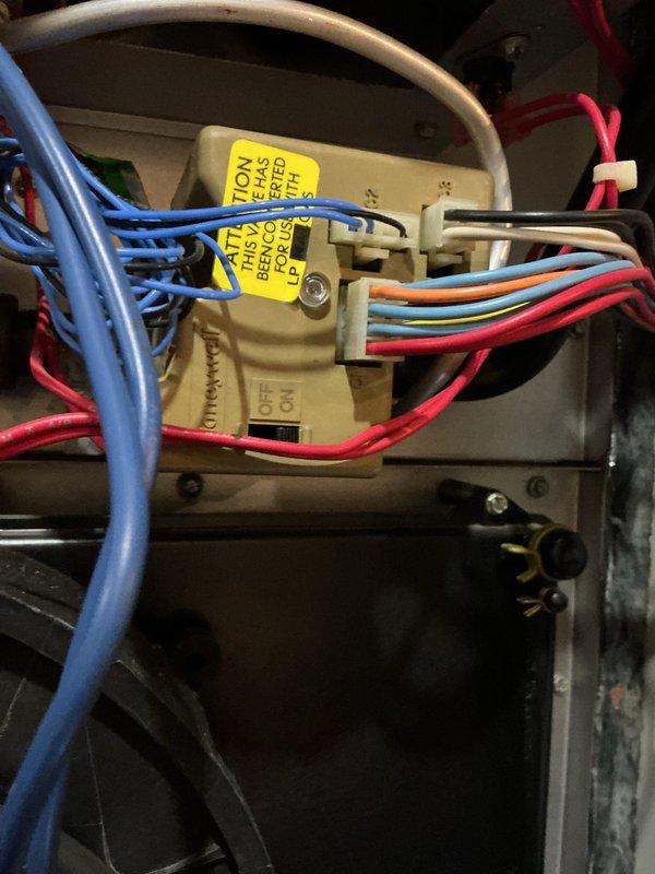 Responded to no heat call on 25-year-old furnace system. Upon inspection, diagnosed failed heat exchanger and defective gas valve preventing ignition. Documented equipment condition with photographs showing age and component failure. Coordinated with comfort advisor regarding system replacement options due to extent of failure and age of unit beyond recommended service life.