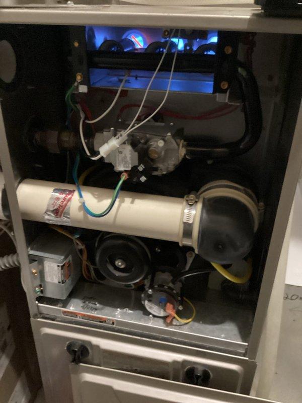 Completed scheduled maintenance tune-up on a six-year-old Bryant high-efficiency gas furnace as part of routine preventative service agreement. Conducted comprehensive safety and performance inspection with no issues reported from previous heating season. Verified burner operation with proper blue flame combustion pattern across all burners. Inspected and confirmed air filter cleanliness, flame sensor condition, hot surface igniter integrity, and all electrical connections secure and functioning properly. Tested and verified gas pressures within manufacturer specifications. Switched humidifier system from summer to winter mode and activated for heating season operation. Inspected blower motor assembly, condensate drain system, and gas valve assembly. All system components found to be in good working order with no immediate concerns or deficiencies identified. Unit operating safely and efficiently, ready for heating season.
