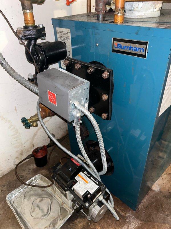 Completed comprehensive boiler tune-up and maintenance inspection on Burnham brand heating system. Performed thorough evaluation of thermostat operation, blower assembly, burner and heat exchanger compartment, inducer motor, ignition system, flame sensor, safety controls, and all electrical components. All operational readings confirmed within normal operating parameters with no mechanical deficiencies or safety concerns identified at time of service.