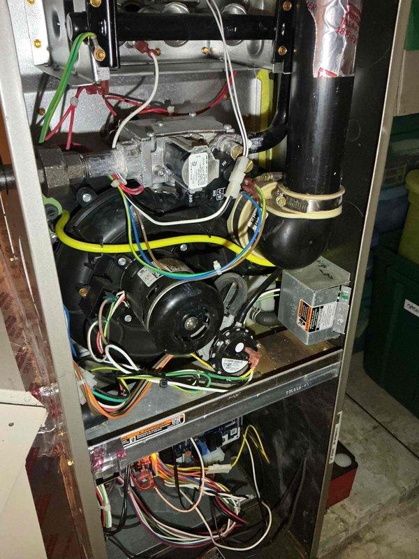 Completed furnace tuneup and inspection, identifying a failing inducer motor and corroded burner assembly. Replaced the defective inducer motor and thoroughly cleaned the rusty burners to restore proper combustion and safe operation. System tested and verified operational upon completion.