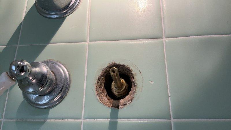 Responded to service call for faucet cartridge replacement. Upon initial assessment, identified fixture as Pfister in-wall ceramic valve system requiring cartridge rebuild. Attempted installation with standard Moen/Delta compatible cartridges, but determined incorrect fitment after opening trim. Removed existing trim to access valve body and confirmed manufacturer specifications. Ordered correct Pfister ceramic valve cartridge (Model: 910-0300) for proper repair completion. Fixture temporarily secured pending arrival of manufacturer-specific replacement parts.