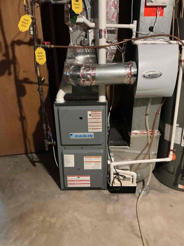 Completed annual cooling maintenance visit on 5-year-old Daikin air conditioning system. Performed comprehensive inspection including contactor testing, capacitor verification, and coil cleaning. Verified amp draws within manufacturer specifications, confirmed proper refrigerant charge levels, and inspected blower wheel condition. Measured temperature drop at 22 degrees, which is within optimal range. Filter found clean and in good condition. All components operating properly with no deficiencies identified or recommendations required at this time.