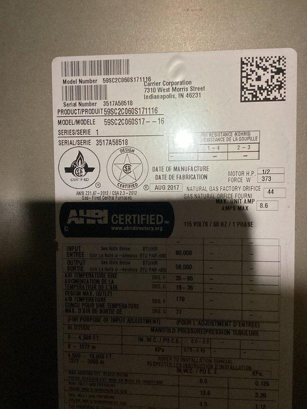 Responded to a no heat call on a 9-year-old Bryant furnace displaying a constant blinking error code. Upon arrival, diagnosed a reverse polarity fault code indicating an electrical system malfunction. Tested transformer voltage output and confirmed reversed polarity. Attempted to correct the issue by reversing the wiring connections, but the error code persisted, indicating a more significant electrical failure within the control system.

Further inspection revealed extensive rust corrosion on the main control board, which was determined to be the root cause of the ongoing electrical fault and system failure. The corroded board was preventing proper electrical communication and causing the reverse polarity error to remain even after correcting the transformer wiring. Documented the failed control board with photographs showing the unit specifications and installation.

Determined that control board replacement is necessary to restore heat and system functionality. Prepared a detailed r
