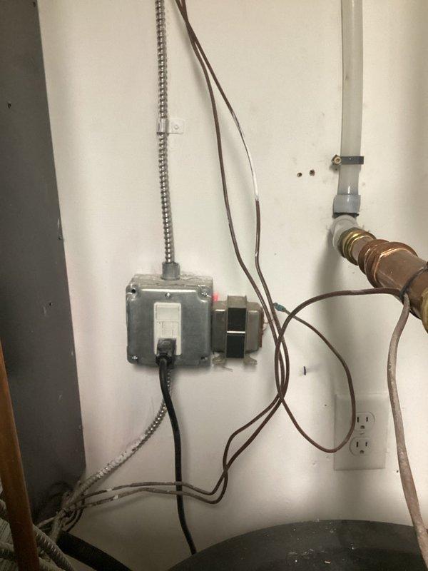 Responded to service call for boiler system with no hot water and failed display. Upon arrival, diagnosed failed control board preventing system operation. Unable to complete scheduled maintenance tune-up due to non-operational control board. Ordered replacement control board for hydronic heating system. Documented existing installation including expansion tank, circulator pump, copper piping network with brass fittings, and stainless steel storage tank. System currently inoperable pending replacement board installation to restore hot water functionality and complete annual maintenance tune-up.
