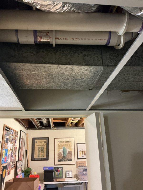 Responded to callback for water heater venting issue following previous service visits where water was accumulating in the vent pipe due to improper pitch. Drained water from vent line and re-pitched the PVC venting system to ensure proper drainage and prevent future water buildup. System now functioning correctly with adequate slope for condensate drainage.