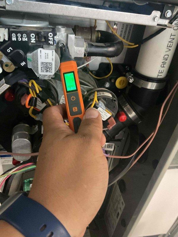 # HVAC Service Report - No Heat Condition

## Service Summary

Responded to no-heat call following recent smart meter installation by utility company. Diagnosed failed gas valve preventing furnace ignition. Replaced defective gas valve and restored heating system to proper operation.

## Work Performed

Upon arrival, confirmed furnace would not initiate ignition sequence. Customer reported heating loss immediately following utility company smart meter installation, with suggestion from utility that air may be present in gas line. Performed comprehensive system diagnostics using digital multimeter to test gas valve operation and electrical components.

Testing revealed gas valve failure preventing fuel delivery to burner assembly. Gas valve showed no electrical continuity and failed to open when heating cycle was called for. Confirmed adequate gas supply at service line and verified proper voltage to valve terminals. Determined gas valve replacement necessary to restore system function.