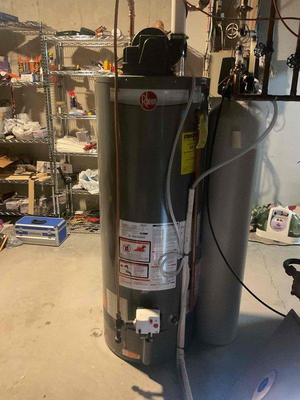 Responded to no heat call on 10-year-old HVAC unit. Found water backed up into inducer motor and pressure switches, causing system failure. Replaced defective inducer motor and pressure switch to restore heating operation.