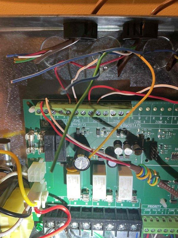 Responded to heating system malfunction with continuous boiler operation and non-responsive thermostats across all zones. Diagnosed stuck end switch preventing proper system shutdown and identified incompatible Nest thermostat causing Taco zone control board to malfunction and display error codes. Removed problematic Nest unit and installed compatible replacement thermostat to restore proper zone control communication. Verified all zone circuits functioning correctly, confirmed proper boiler cycling, and tested thermostat calls across all five zones to ensure system responded appropriately to heat demand.