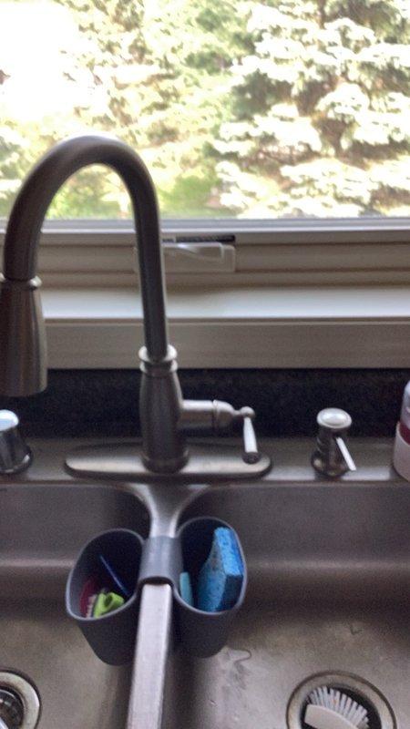 Completed comprehensive plumbing inspection on residential property with 20-year-old home featuring recently installed water heater. Adjusted water supply line on toilet to ensure proper fill valve operation and prevent potential leaks or running water issues. Inspected all visible plumbing fixtures including kitchen sink with pull-down faucet and bathroom toilet, verifying proper drainage, water pressure, and fixture functionality throughout the home.