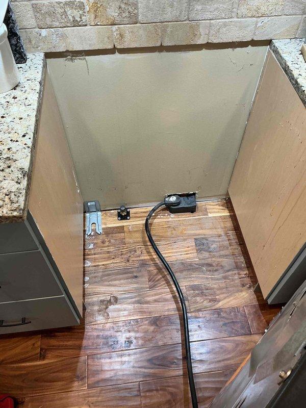 Installed flexible gas line up to 10 feet with two fittings to supply new stove location. Drilled access point through kitchen floor at appliance alcove and installed gas-tight floor bracket with fitting. Accessed basement area below and tapped into existing gas supply line, running new branch line vertically through floor to terminate at kitchen level. Secured all connections with proper fittings and brackets. Pressurized the gas system and performed leak detection testing on all new joints and fittings—no leaks detected. System passed pressure test successfully. Shut off gas supply at isolation valve and capped the terminal end of the new gas line. Installation is ready for appliance connection by stove installer, who will remove cap and complete final hookup to appliance.