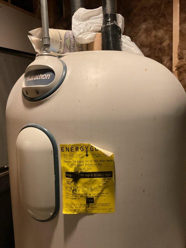 Responded to no-cooling complaint on 2001 Carrier R-22 air conditioning system experiencing repeat evaporator coil freeze-ups. Upon arrival, confirmed frozen evaporator coil and liquid line set. Performed diagnostic testing and found system operating with only 2.7–3°F subcooling versus manufacturer specification of 13°F after 10-minute run cycle, indicating low refrigerant charge or potential liquid-side metering/restriction issue. Verified air filter was clean and inspected outdoor condenser unit, finding no electrical defects or mechanical issues with condenser components. Documented visible corrosion and weathering on outdoor unit consistent with 20-year-old equipment age. Recommended full refrigerant leak detection, repair evaluation, and recharge to restore proper system operation and prevent continued freeze-up conditions. Additionally recommended pre-season heat exchanger inspection on paired Payne 40-inch furnace with polypropylene-lined secondary heat exchanger due to known is