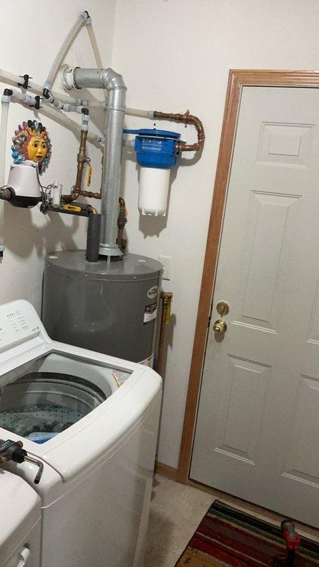 Responded to no hot water complaint at owner-occupied residential property. Upon arrival, found Richmond brand tanked water heater with pilot light that would not ignite or remain lit. Inspected gas supply, thermocouple, and pilot assembly for proper operation. Successfully relit pilot light and verified stable flame and proper burner operation. Tested hot water delivery to fixtures to confirm system functionality. Provided customer with replacement options and estimates for new water heater installation due to age and condition of existing unit. Unit currently operational following pilot relight.