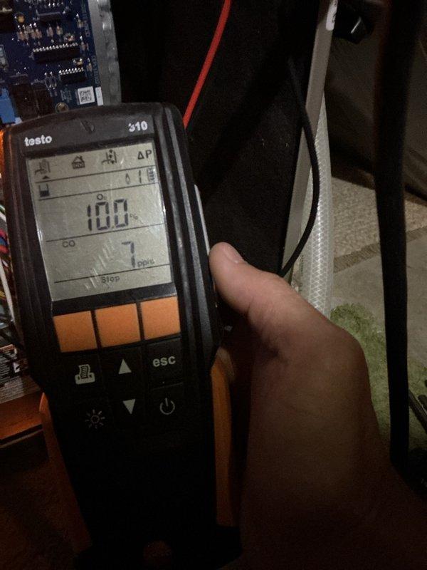 Completed annual maintenance on 2017 Bryant furnace including comprehensive system inspection and tune-up. Cleaned flame sensor and burners, inspected heat exchanger with no cracks or holes detected, flushed condensation trap, and verified inducer motor and blower motor operation. Identified missing W2 thermostat wire preventing second stage heating operation after 16-18 minute observation period. Installed jumper wire from W1 to W2 terminal to restore proper two-stage heating functionality. Conducted safety testing with carbon monoxide levels measuring 7 ppm and gas supply pressure at 3.16" W.C., both within acceptable operating parameters. System now operating correctly and prepared for heating season.