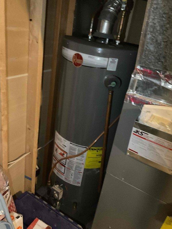 Completed routine plumbing inspection as part of recurring maintenance service. Inspected water heater unit (Rheem brand, 5+ years old) and found all components functioning properly with no leaks, corrosion, or safety concerns identified. Examined utility sink plumbing fixtures, valves, and supply lines; all connections secure and operational. Documented existing conditions including wall moisture staining near utility sinks and sediment accumulation in lower basin, which appear to be pre-existing cosmetic issues not affecting plumbing system performance. All plumbing systems inspected passed visual examination with no immediate repairs required.