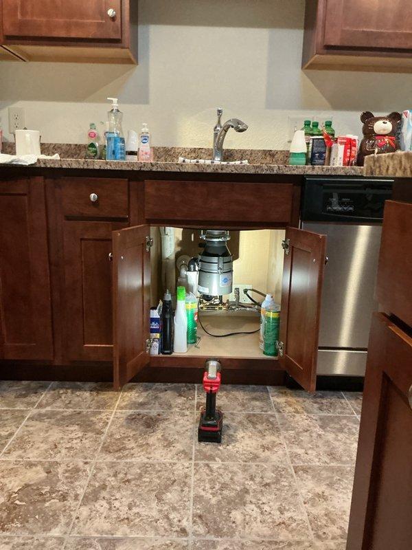 Responded to service call for non-operational garbage disposal unit. Upon inspection, determined that the disposal had become unplugged from the electrical outlet beneath the sink. Restored power by reconnecting the unit to the outlet, tested operation to confirm proper functionality. Provided estimates for replacement disposal unit options per customer request for future consideration.