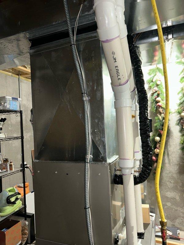 Completed comprehensive furnace tune-up inspection with all system components verified to be operating within normal parameters. Performed maintenance including cleaning flame sensor, clearing condensate drain line, and clearing pressure and condensation tubes. Noted burners showing poor condition with corrosion buildup requiring future attention, though no immediate mechanical deficiencies or safety issues were identified at this time.