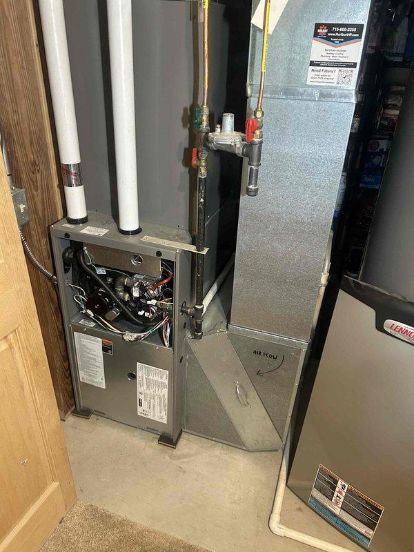 Completed scheduled heating maintenance and furnace tune-up on residential HVAC system. Performed comprehensive operational testing including temperature rise verification, gas pressure adjustment confirmation, flame sensor cleaning, and igniter inspection. Replaced air filter, flushed condensate drain line to ensure proper drainage, inspected blower compartment and assembly, and verified all pressure switches functioning correctly. All system components operating within manufacturer specifications with no issues identified.