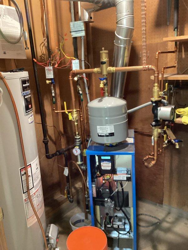 Responded to no heat complaint where boiler was not delivering hot water to radiators. Diagnosed malfunctioning zone valve that was receiving power but failing to open due to defective power head. Previous service provider had misdiagnosed issue as zone damper communication failure with thermostat. Confirmed zone valve motor failure and provided estimate for power head replacement to restore proper zone operation and heat distribution to affected radiators.