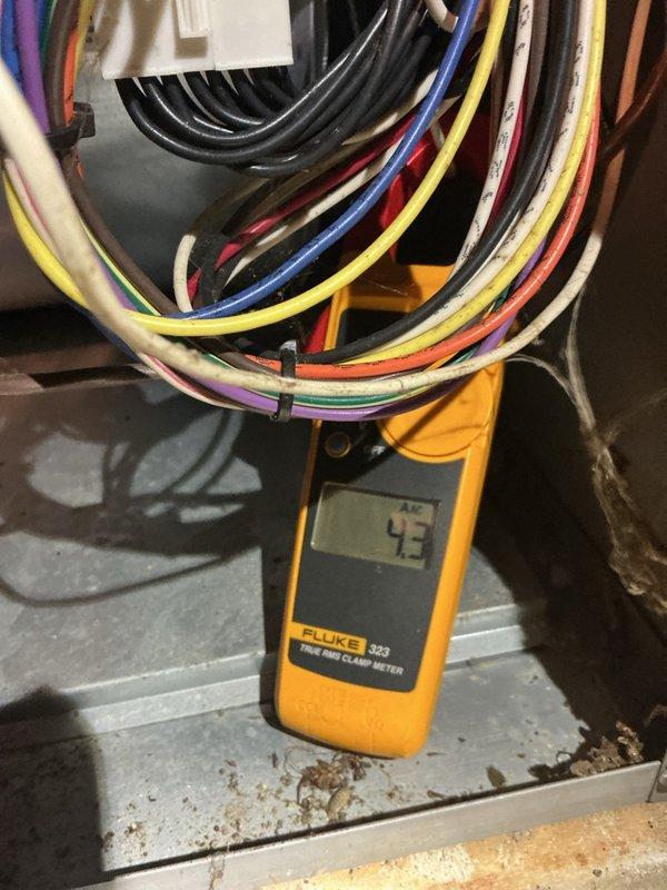 Completed comprehensive furnace tune-up on a 7-year-old Lennox unit located in crawl space under the home. Performed full system inspection including cleaning flame sensor, inspecting heat exchanger, checking air filter, blower motor, capacitor, and control board—all components found in good working condition. Conducted carbon monoxide testing with acceptable reading of 6 ppm. Identified and resolved wiring issue preventing second stage heat from activating; corrected miswired W2 terminal by properly connecting to W1 and W2, restoring full two-stage heating operation. System tested and confirmed operational for winter season.