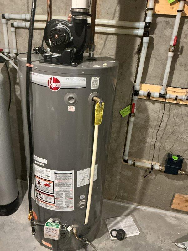 Completed comprehensive plumbing inspection including hot water heater maintenance and full system evaluation. Performed complete flush of Rheem water heater unit (manufactured 08/2022) to remove sediment buildup and ensure optimal performance. Conducted thorough inspection of all visible plumbing components including water heater connections, copper piping, PEX lines, brass valves, and circulation pump assembly. All plumbing systems found to be in good working condition with no leaks, corrosion, or operational concerns identified. Recommended adding one bag of salt to water softener to maintain proper water treatment system function and prevent hard water issues.