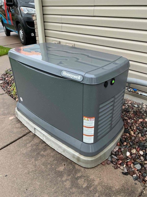 Completed annual preventative maintenance tune-up on one-year-old Generac standby generator operating under maintenance agreement. Performed full service including oil change, spark plug replacement, air filter replacement, oil filter replacement, battery inspection, and reset maintenance notification on control panel. Generator tested and confirmed operating properly with all systems functioning as designed.