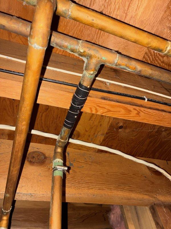 Responded to emergency water leak in basement caused by pinhole failure in copper supply line. Upon inspection, found copper piping exhibited severe deterioration with extremely soft and thin pipe walls, indicating advanced corrosion and imminent failure risk. Successfully repaired the active leak in the copper pipe using appropriate fittings and techniques. Due to the compromised condition of the existing copper plumbing system throughout the property, scheduled full house water repipe to prevent future failures and ensure system integrity.