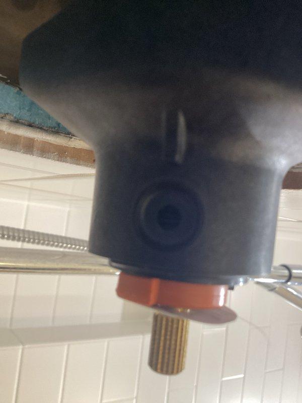 Completed plumbing inspection and multiple repairs. Diagnosed and replaced defective Kohler cartridge in lower bathroom shower valve due to malfunction. Installed customer-supplied bathroom sink with new faucet and handle assembly to replace broken fixture. Inspected hydronic heating system with multiple zone circulators, copper distribution piping, and associated controls—all components found operating within normal parameters. Documented existing plumbing infrastructure including three-zone circulator pump configuration, gas line routing, and system control panels. All repairs tested and verified for proper operation with no leaks detected.