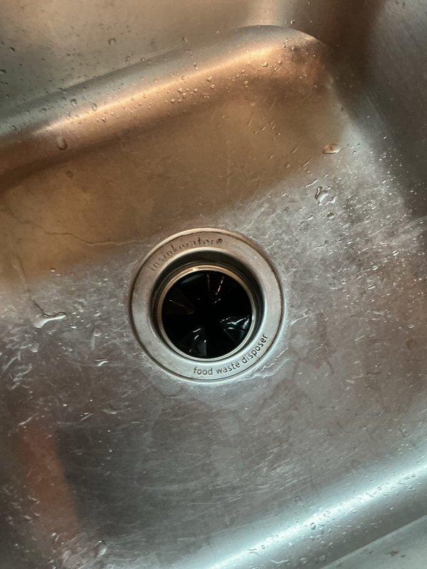 Responded to service call for non-functioning InSinkErator garbage disposal unit. Upon inspection, determined the disposal was jammed and successfully cleared the obstruction, restoring full operational functionality. Additionally performed seasonal maintenance by winterizing exterior spigots to prevent freeze damage and conducted a comprehensive plumbing walk-through inspection of the property.