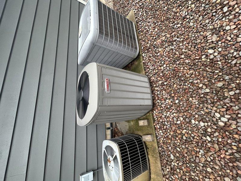Completed annual maintenance agreement service on two active HVAC systems including furnace and air conditioning tune-ups. Performed operational testing on main basement furnace, replaced air filter, verified temperature rise within specifications, and identified active leak in collector box causing rust accumulation in combustion compartment along with steam humidifier canister requiring replacement. Inspected upstairs furnace with all components and temperature rise checking out satisfactorily, noted air filter replacement needed but spare not available on-site. Cleaned debris from outdoor condensing units, tested air conditioning operation on both active systems, and confirmed proper operation. Property has three total systems but older Carrier system with electric air handler is not in use. Provided pricing recommendations for steam humidifier canister, collector box replacement, and upstairs air filter replacement.